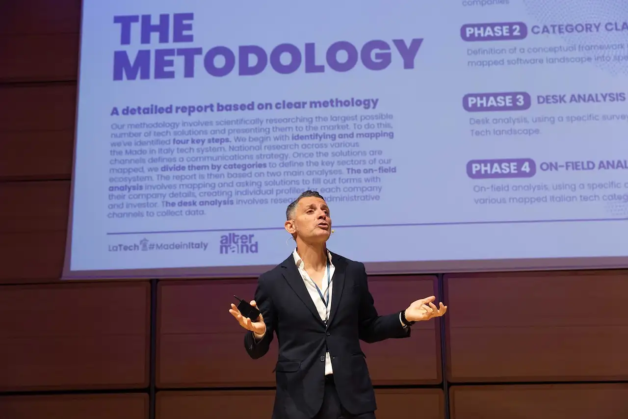 A speaker explaining the report methodology