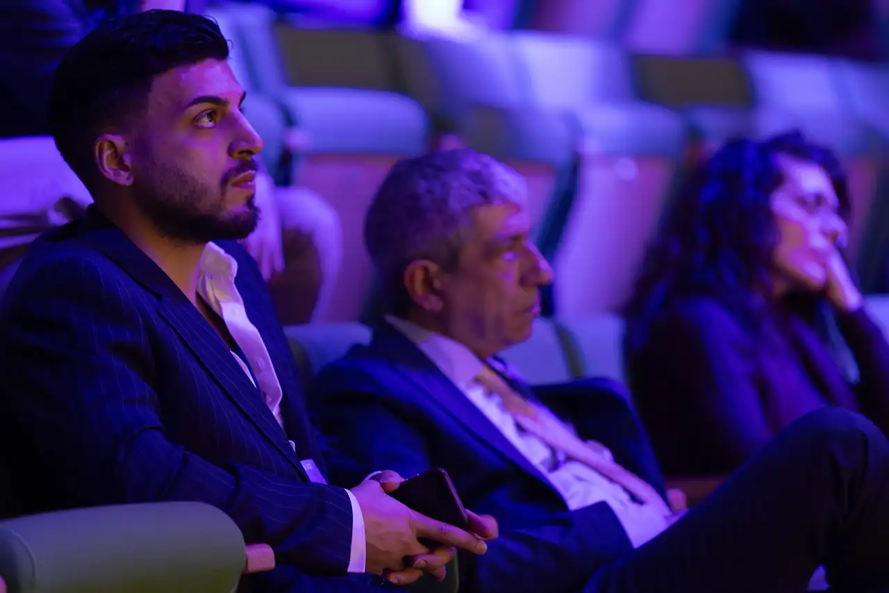 Attendees in the auditorium